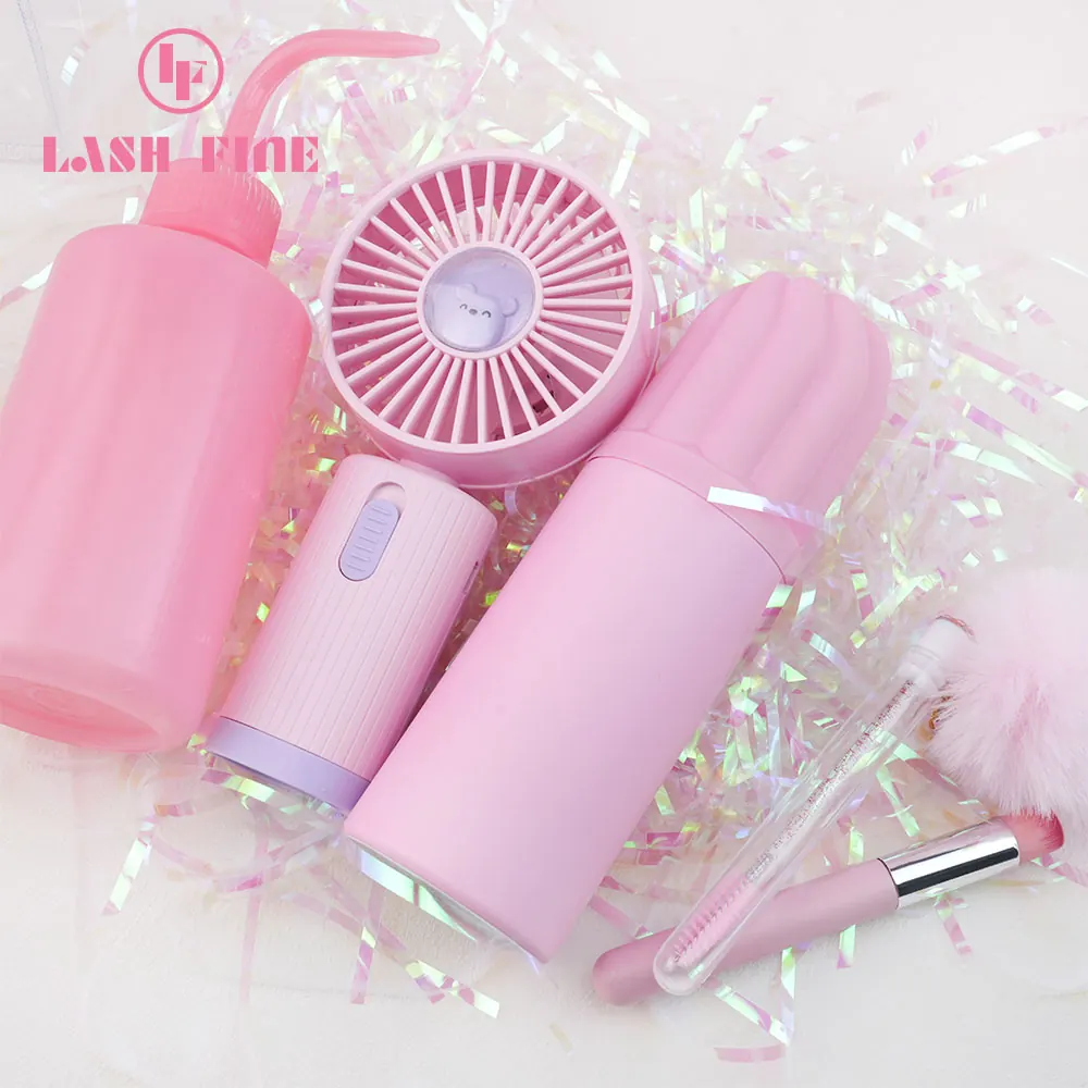 Lash Fine tool set in a clear carry bag with a foam bottle and studio accessories
